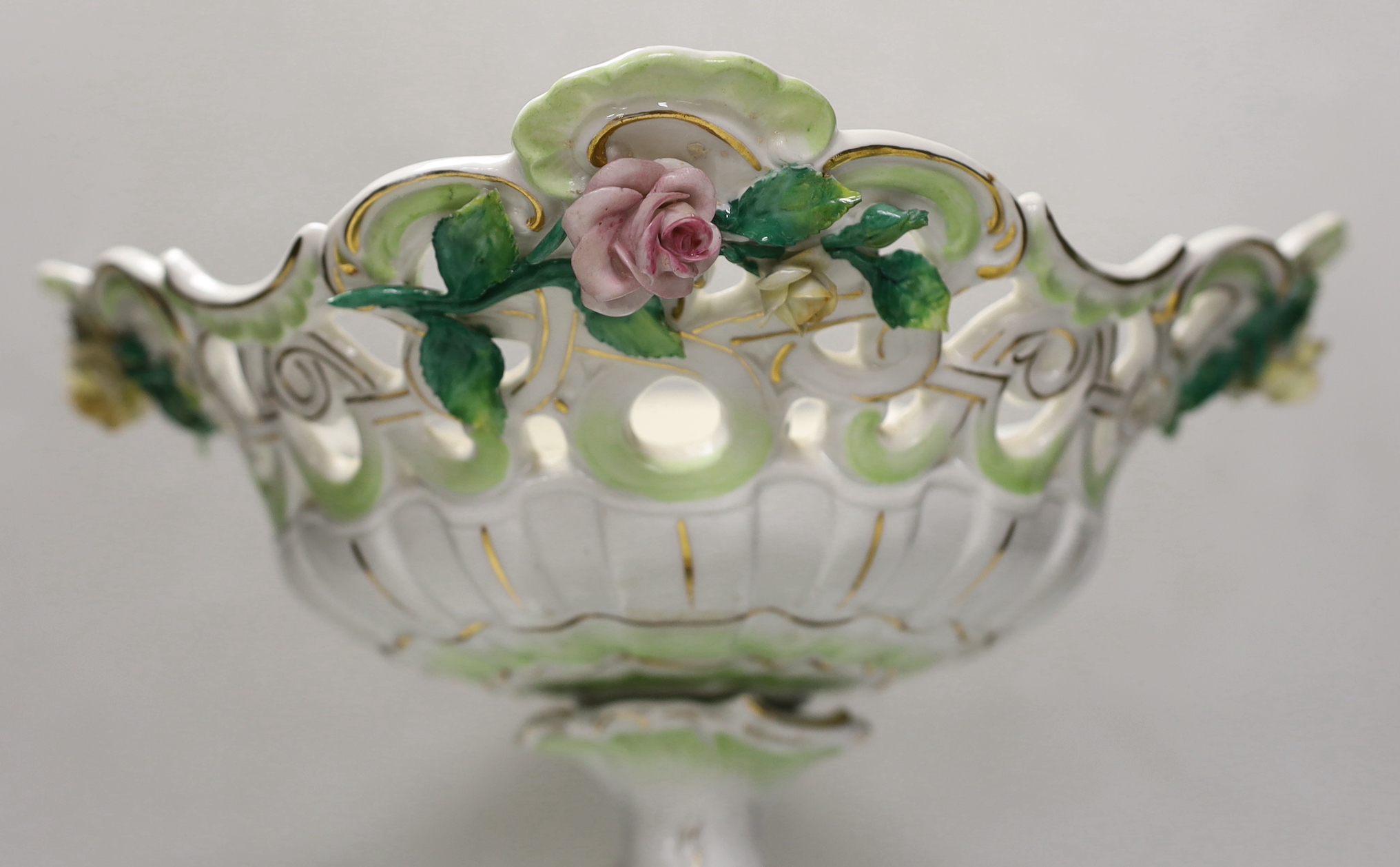 A 19th century German encrusted porcelain centrepiece, 33cm